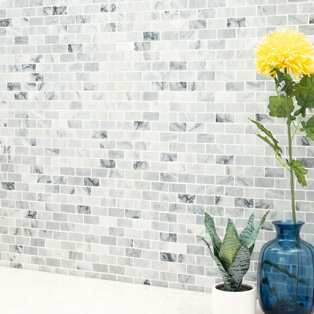 Carrara Classique Brick 1x2 Honed Tile in a kitchen