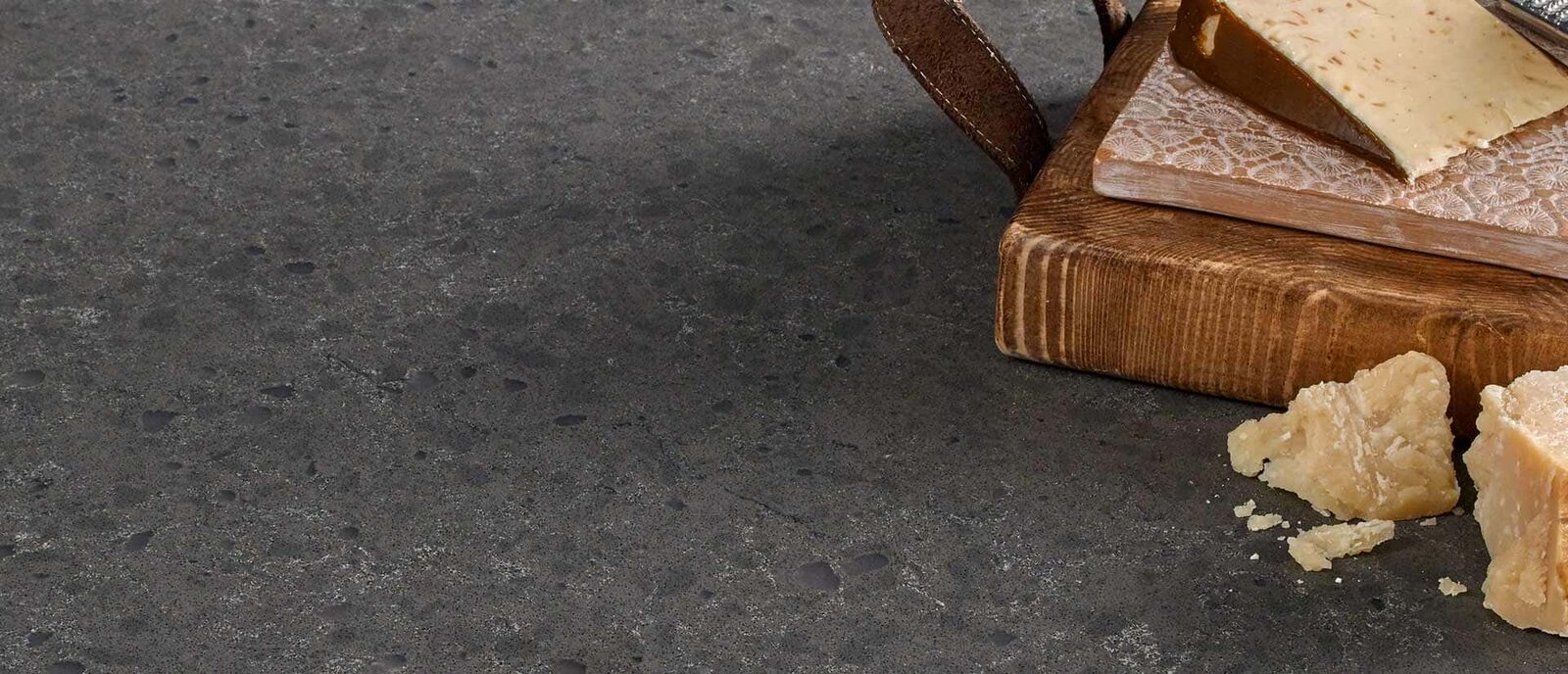 Concrete-look matte quartz countertops in a modern kitchen