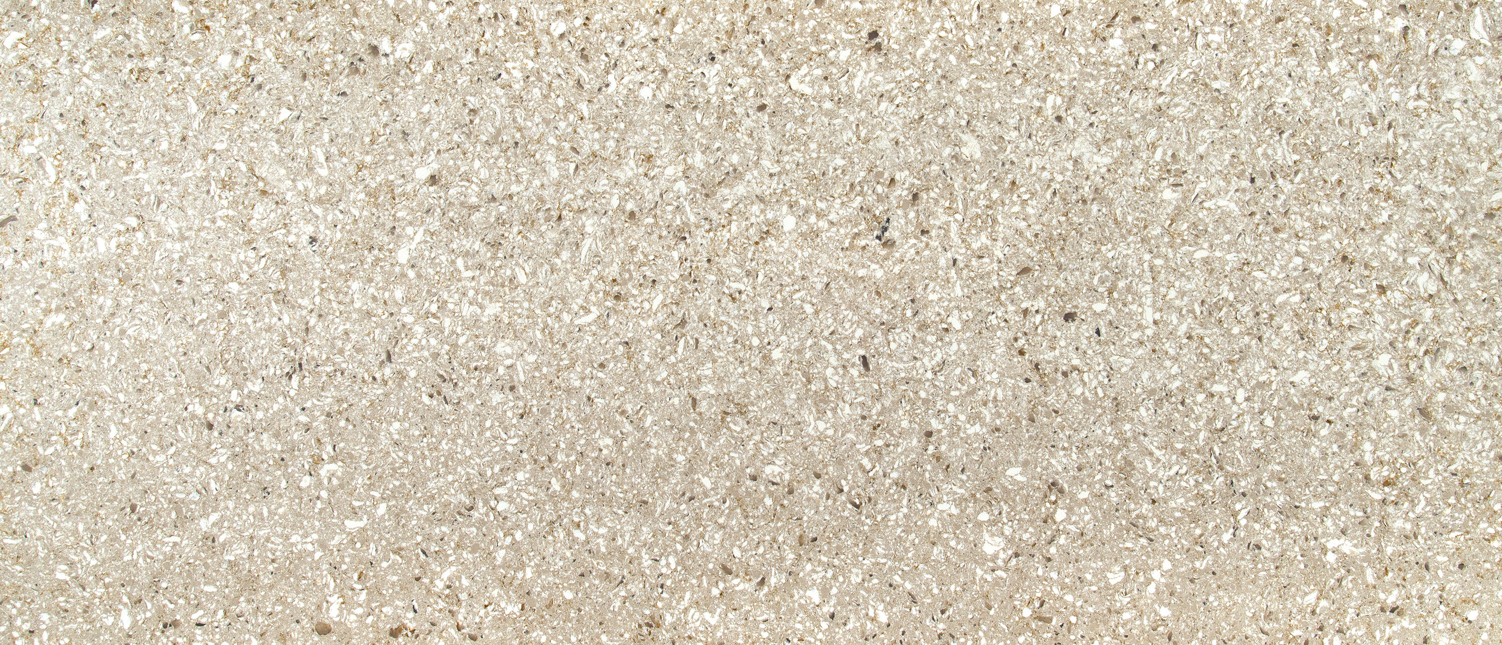 Warm beige quartz countertops in a modern kitchen