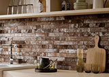 Brickstone Rustique Red Brick 2x18 Porcelain in a kitchen