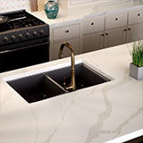 Calacatta Idillio Quartz Engineered Quartz in a kitchen