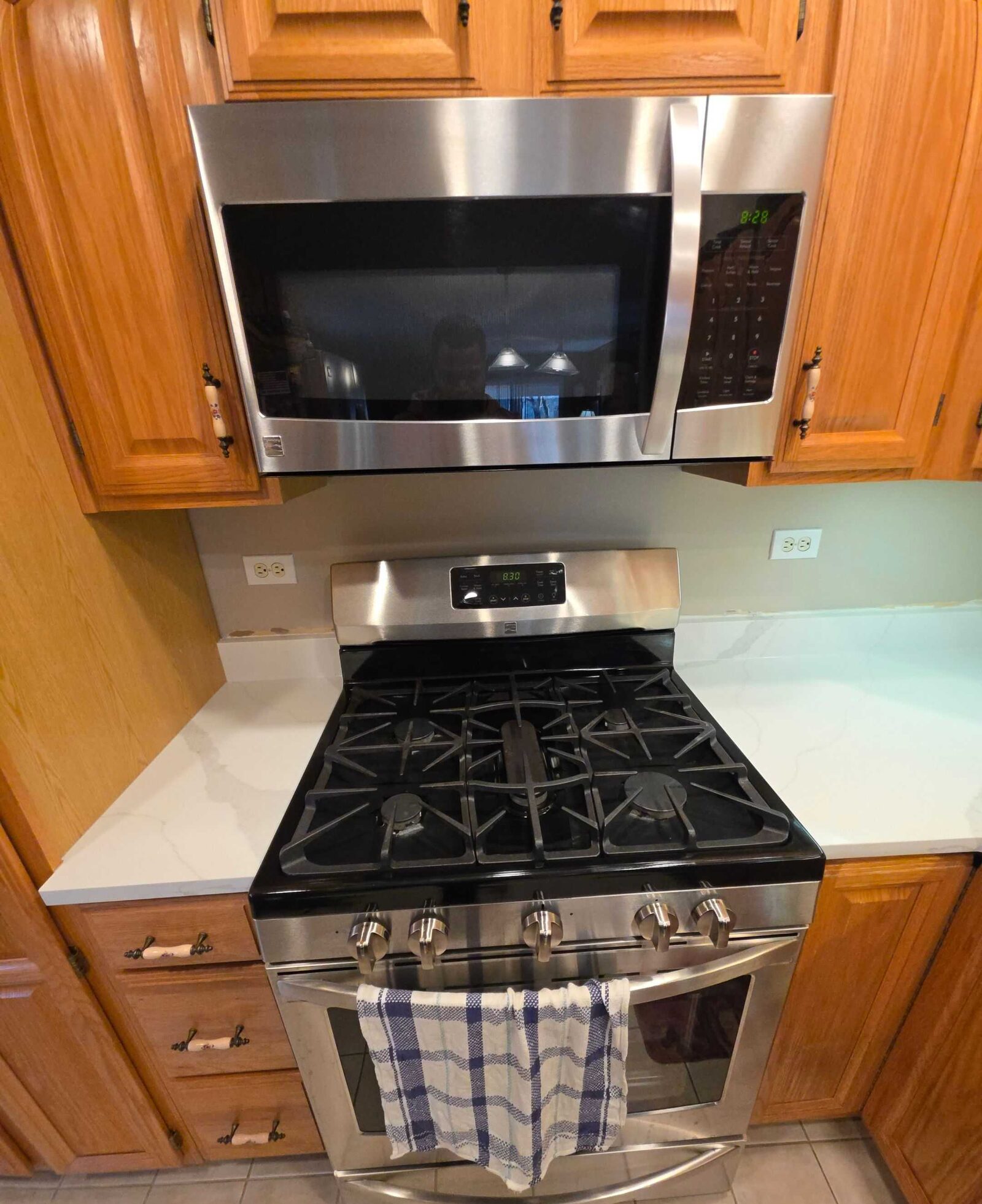 Quartz meeting the stainless range, showing the counter's light movement up close