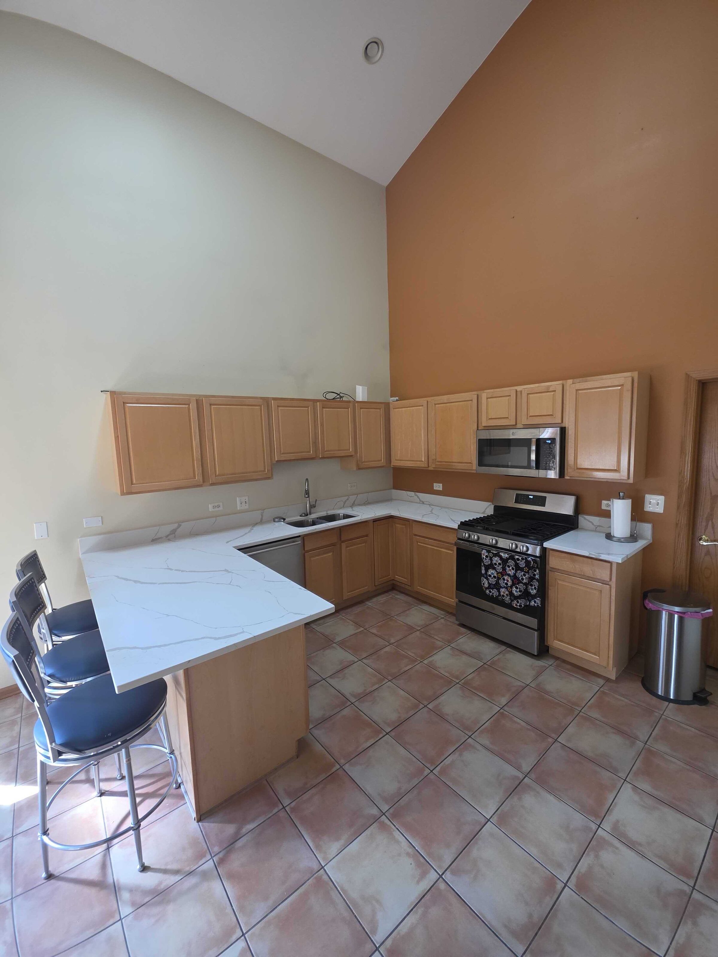 Oak kitchen, terracotta floor