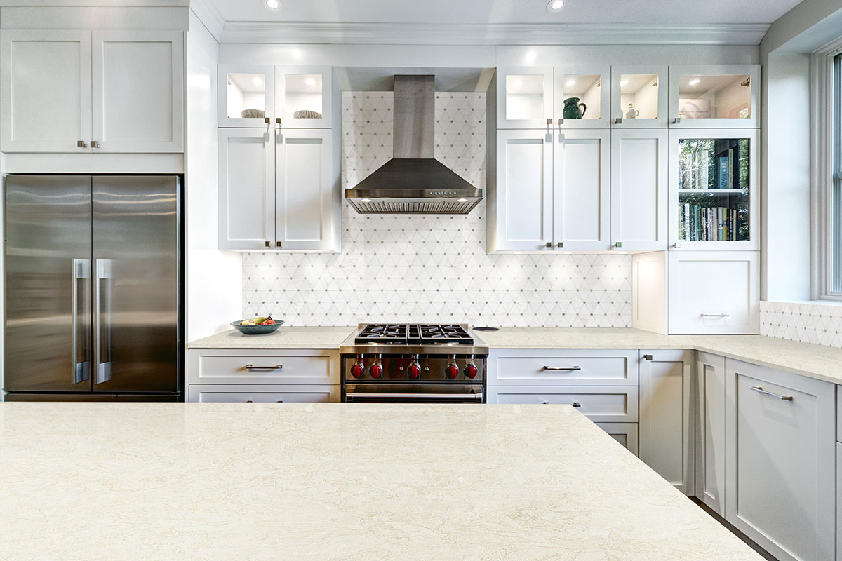 Bianco Dolomite Pinwheel Polished Marble Mosaic Tile — installed in a kitchen (scene 1669)