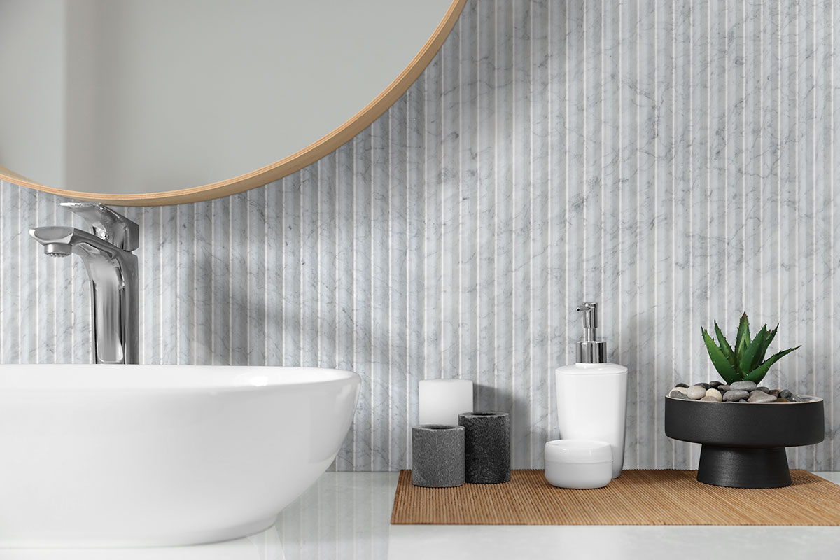 Carrara White Valentino Fluto 12x24 Honed Tile — installed in a bathroom (scene 0691)