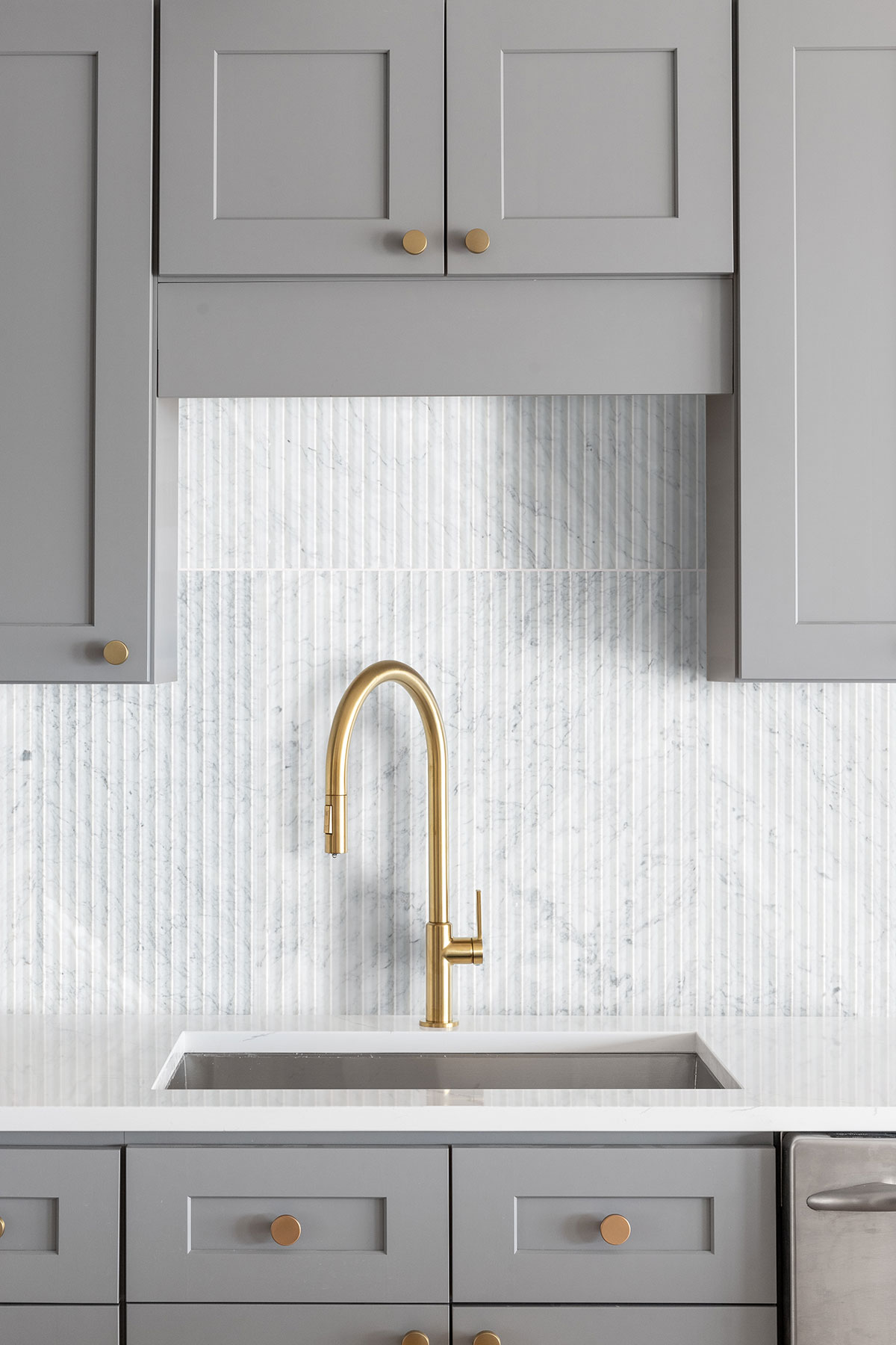 Carrara White Valentino Fluto 12x24 Honed Tile — installed in a kitchen (scene 1063)