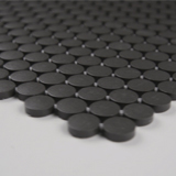 Penny Round Nero 6mm Matte  in a kitchen