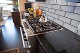 Ice Bevel Glass Tile 4x12 in a kitchen