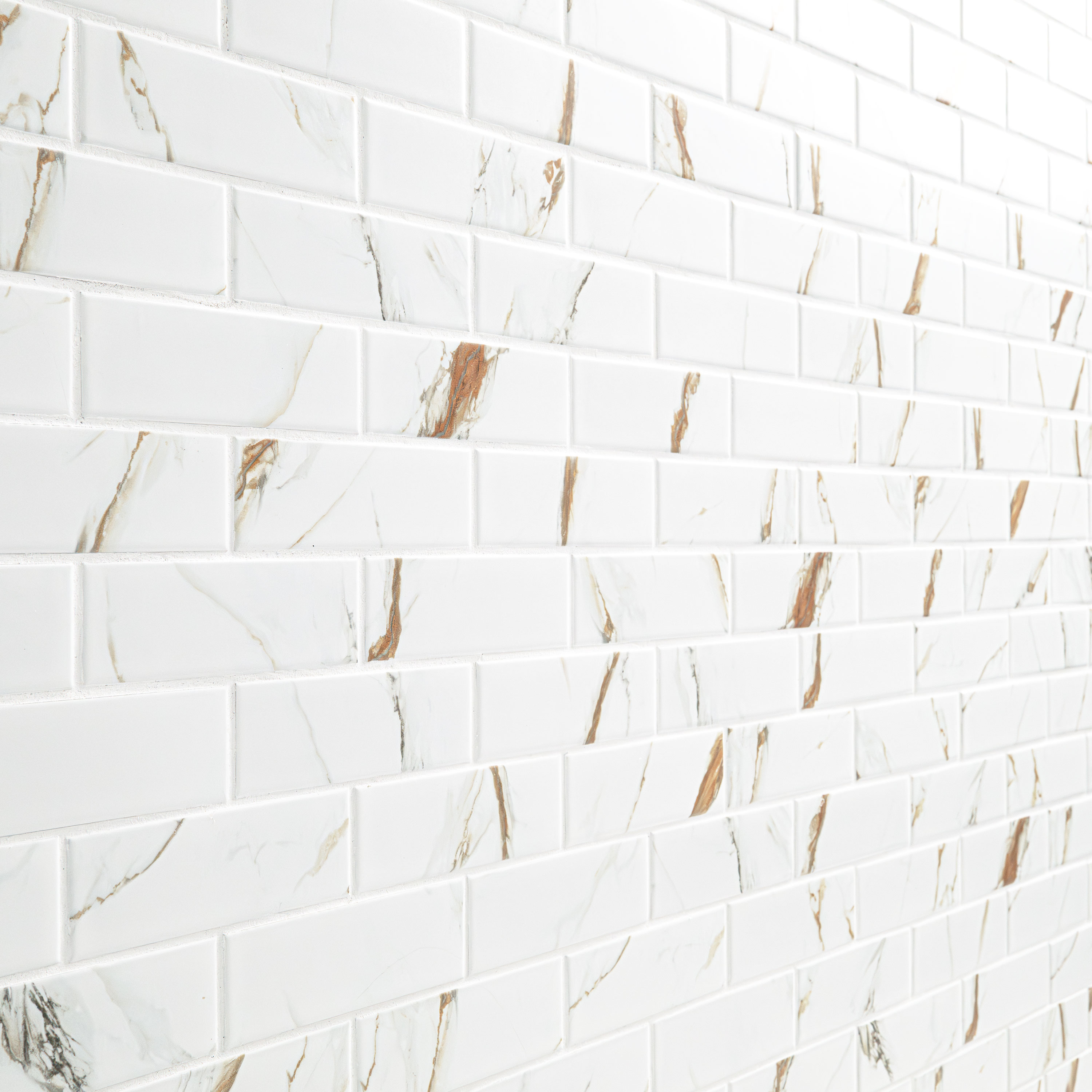 Calacatta Gold Matte Subway Tile 2x6 Ceramic in a kitchen