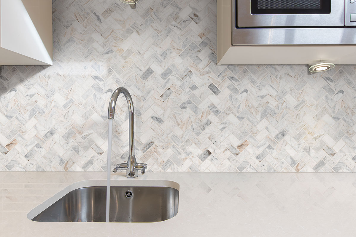 Capri Blue 1x2 Herringbone Honed Subway Tile — installed (view 2)